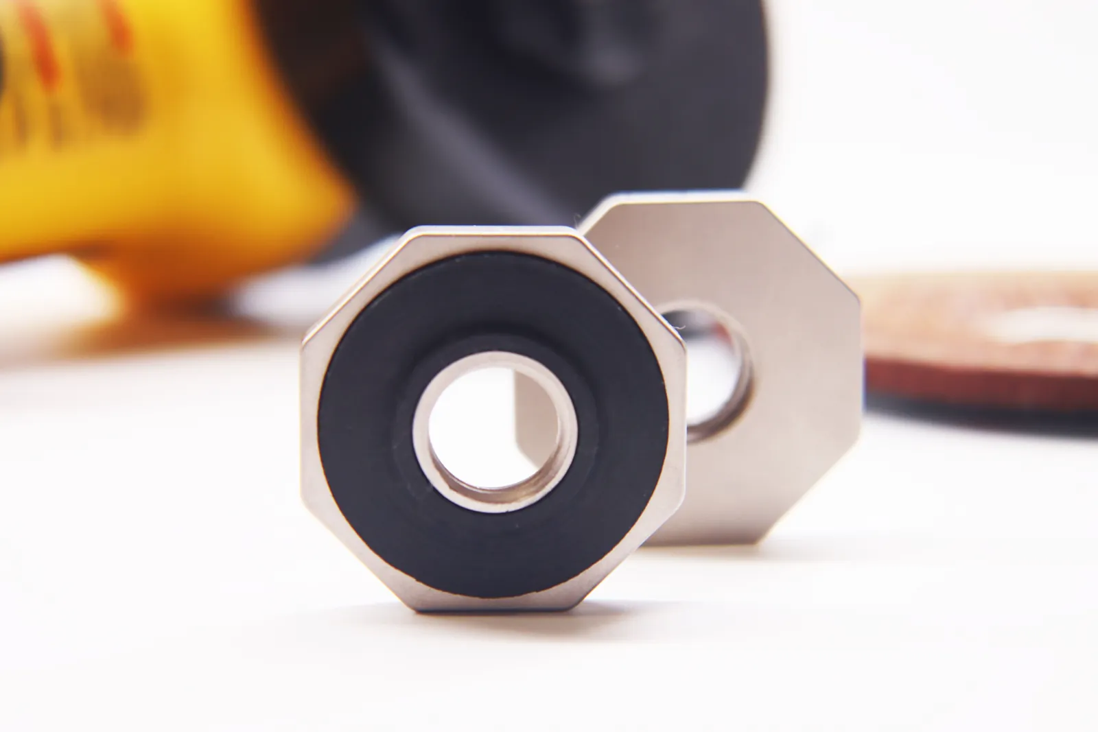 Magic Flange Nut mounted on a 5/8-inch-11 angle grinder spindle